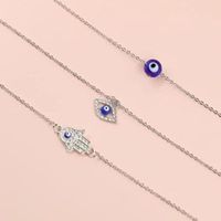 Devil&#39;s Eye Glass Ball Alliage Palm Blue Eye Diamond Collier Pendentif Mode Chandail Chaîne main image 1