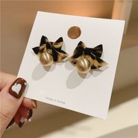 Korea Autumn And Winter Matching Leopard Bow Pearl Personality Small Earrings main image 3