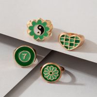 Simple Fashion Green Hit Color Tai Chi Flower Grid Heart Number 7 Drops Oil Ring 4-piece Set main image 4