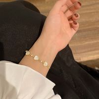Koreanische Nachahmung Katzenauge Verstellbares Herz Armband Mode Metall Textur Hand Ornament Großhandel main image 5