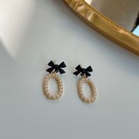 Sterling Silver Needle Japanese And Korean Ins Style Bow Pearl Oval Earrings Fashionable Elegant Lady Earrings H4130 main image 4