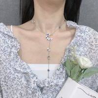 Niche Ins Style Micro Inlaid Zircon Star Moon Y-shaped Mid-length Clavicle Chain Dark Blue Sun Moon Star Necklace main image 3