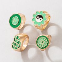 Simple Fashion Green Hit Color Tai Chi Flower Grid Heart Number 7 Drops Oil Ring 4-piece Set sku image 1