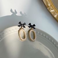 S925 Silver Needle Japan Und Südkorea Ins Wind Bowknot Perlen Ovale Ohrringe Mode Und Elegante Damen Ohrringe H4130 sku image 1