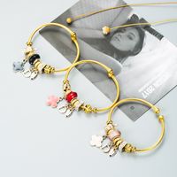 Europäische Und Amerikanische Neue Mode Diy Blume Brief Legierung Dora Armband Einfache Und Vielseitige Perlen Stahldraht Armband Zubehör main image 3