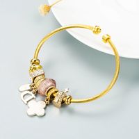 Europäische Und Amerikanische Neue Mode Diy Blume Brief Legierung Dora Armband Einfache Und Vielseitige Perlen Stahldraht Armband Zubehör main image 4