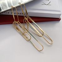 Pendientes Ovalados Europeos Y Americanos Ins Estilo Frío Diseño De Metal Brillante Geométrico Personalizado Largo En Forma De U Pendientes Para Mujer main image 1