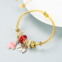 Europäische Und Amerikanische Neue Mode Diy Blume Brief Legierung Dora Armband Einfache Und Vielseitige Perlen Stahldraht Armband Zubehör sku image 1