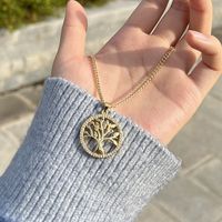 New Gold-plated Copper Zircon Tree Of Life Necklace Hollow Tree-shaped Round Pendant main image 1