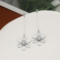 Fashion Classic Hollow Flower Copper Inlaid Zircon Earrings main image 1