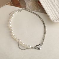 New Retro Pearl Simple Stitching Pearl Chain Heart Pendant Necklace main image 4