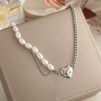 New Retro Pearl Simple Stitching Pearl Chain Heart Pendant Necklace main image 1
