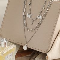 New Butterfly Creative Stacking Silver Alloy Disc Pendant Three-layer Necklace main image 5