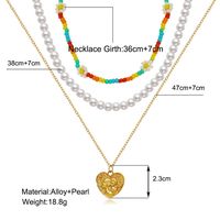 New Multi-layer Stacking Daisy Rice Beads Heart-shaped Embossed Pearl Necklace Wholesale main image 5