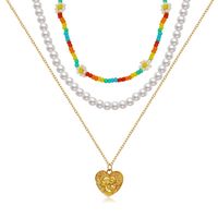 Nouveau Collier De Perles En Relief En Forme De Coeur De Perles De Riz Marguerite Empilables Multicouches En Gros main image 6