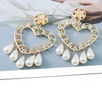 Creative Heart-shaped Water Drop Pearl Shape Female Stud Earrings main image 6