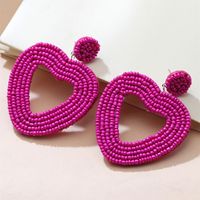 Holiday Color Ethnic Red Bead Hollow Heart-shaped Earrings sku image 2