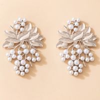 Retro Ethnic Geometric Hollow Round Fashion Pearl Fun Alloy Earrings sku image 1