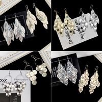 European And American Long Hollow Leaf Heart Frosted Disc Tassel Earrings main image 1