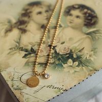 Süße Perlenkette Mit Runder Karte Diamant Schlüsselbeinkette Titanstahl Halskette main image 4