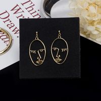 Tide Dating Geometric Exaggerated Personality Face Earrings main image 5