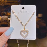Chaîne De Clavicule En Forme De Coeur Incrustée De Perles De Mode Collier En Cuivre À Chaîne Courte En Gros main image 1