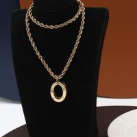 Simple Classic Golden Twist Chain Hollow Pendent Copper Earrings main image 3
