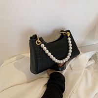 2021 Pearl Fashion Handbags Crocodile Pattern Solid Color Underarm Bag Wholesale main image 4