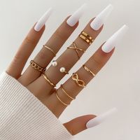 Fashion Figure 8 Pearl Open Joint Ring Retro Pearl Twist Ring 9 Piece Set sku image 1