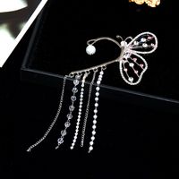 Hot Sale Inlaid Rhinestone Butterfly Earrings Creative Personality Flashing Diamond Chain Pearl Tassel Ear Clip main image 3