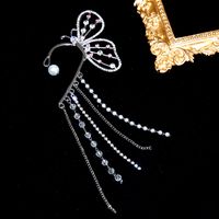 Hot Sale Inlaid Rhinestone Butterfly Earrings Creative Personality Flashing Diamond Chain Pearl Tassel Ear Clip main image 5