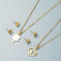 Fashion Stainless Steel Hollow Heart-shaped Butterfly Four Leaf Clover Necklace Earrings Set main image 1