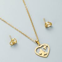 Fashion Stainless Steel Hollow Heart-shaped Butterfly Four Leaf Clover Necklace Earrings Set sku image 1