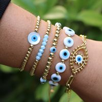 Simple Ethnic Colored Glaze Evil Eye Color Gold Bead Multi-layered Bracelet main image 1