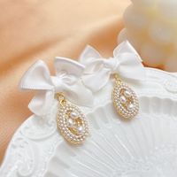 Korean Retro Fabric Bow Pearl Earrings Temperament Fashion Earrings sku image 1