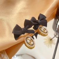 Korean Retro Fabric Bow Pearl Earrings Temperament Fashion Earrings sku image 2