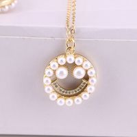 European And American Style Inlaid Pearl Zircon Hollow Smiley Face Pendant Necklace sku image 1