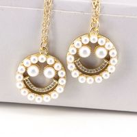 European And American Style Inlaid Pearl Zircon Hollow Smiley Face Pendant Necklace main image 3