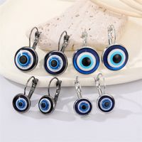 Retro Glitter Blue Eye Bronze Metal Edging Devil's Eye Earrings main image 1