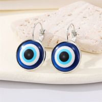 Retro Glitter Blue Eye Bronze Metal Edging Devil's Eye Earrings main image 4