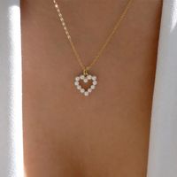 Simple Style Heart Metal Artificial Pearls Women's Pendant Necklace main image 1