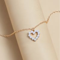 Einfacher Stil Herz Metall Künstliche Perlen Frau Halskette Mit Anhänger main image 6
