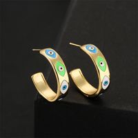 Europe And America New Copper-plated Real Gold Oil Dripping Devil’s Eye Earrings main image 1