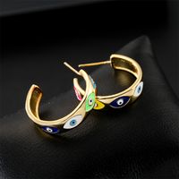 Europe And America New Copper-plated Real Gold Oil Dripping Devil’s Eye Earrings main image 3
