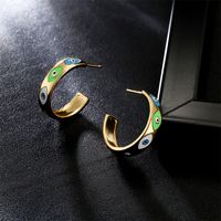 Europe And America New Copper-plated Real Gold Oil Dripping Devil’s Eye Earrings main image 4