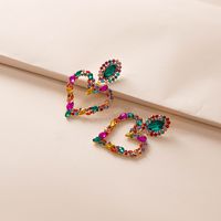 Boucles D&#39;oreilles Européennes Et Américaines Simples En Forme De Coeur En Alliage De Diamants En Gros main image 5