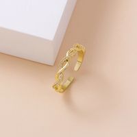 European And American Niche Golden Ring Micro-inlaid Simple Twist Open Ring Wholesale main image 1