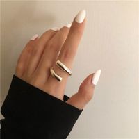 Fashion Double-layer Hollow Niche Design Staggered Irregular Curve Opening Copper Ring main image 5