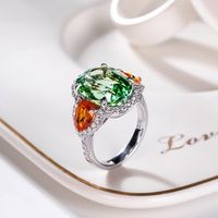 New Green Tourmaline Ring Shining Bright Orange Red Fanta Stone Inlaid Open Copper Ring main image 1