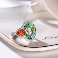 New Green Tourmaline Ring Shining Bright Orange Red Fanta Stone Inlaid Open Copper Ring main image 4